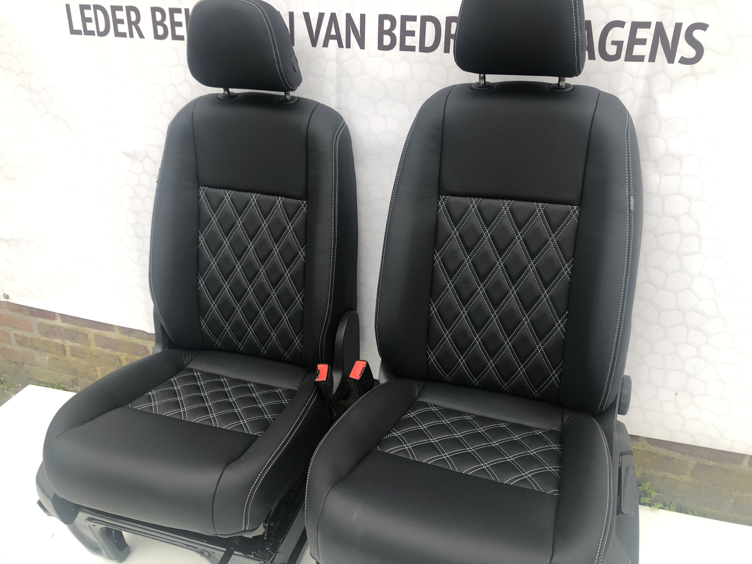 Bestuurdersstoel+Bijrijdersstoel met zwart leder voor VW Caddy